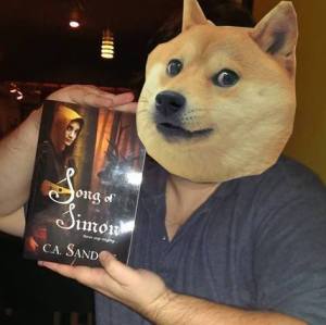 Craig with book and dog head
